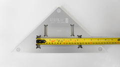 Verifying the accuracy of a tape measure at the 6" push measurement using a Lixer Bench Square Multi-Instrument Calibration Tool NIST Traceable or ISO certifcation is available on Lixer Tools.